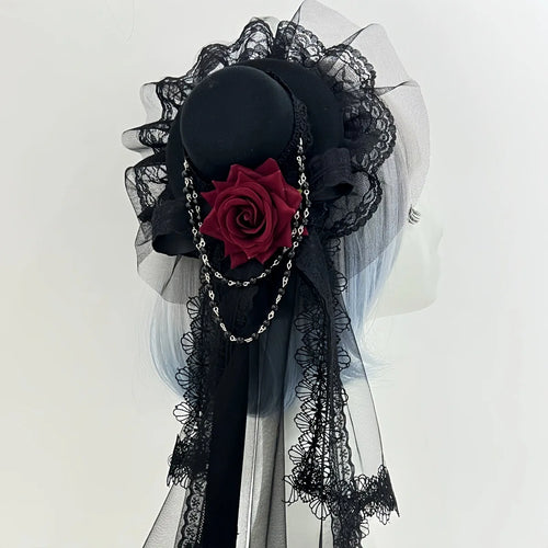Mini chapeau à voilette et rose