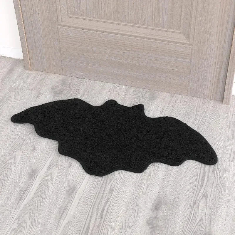 Tapis découpé en forme de chauve-souris noire