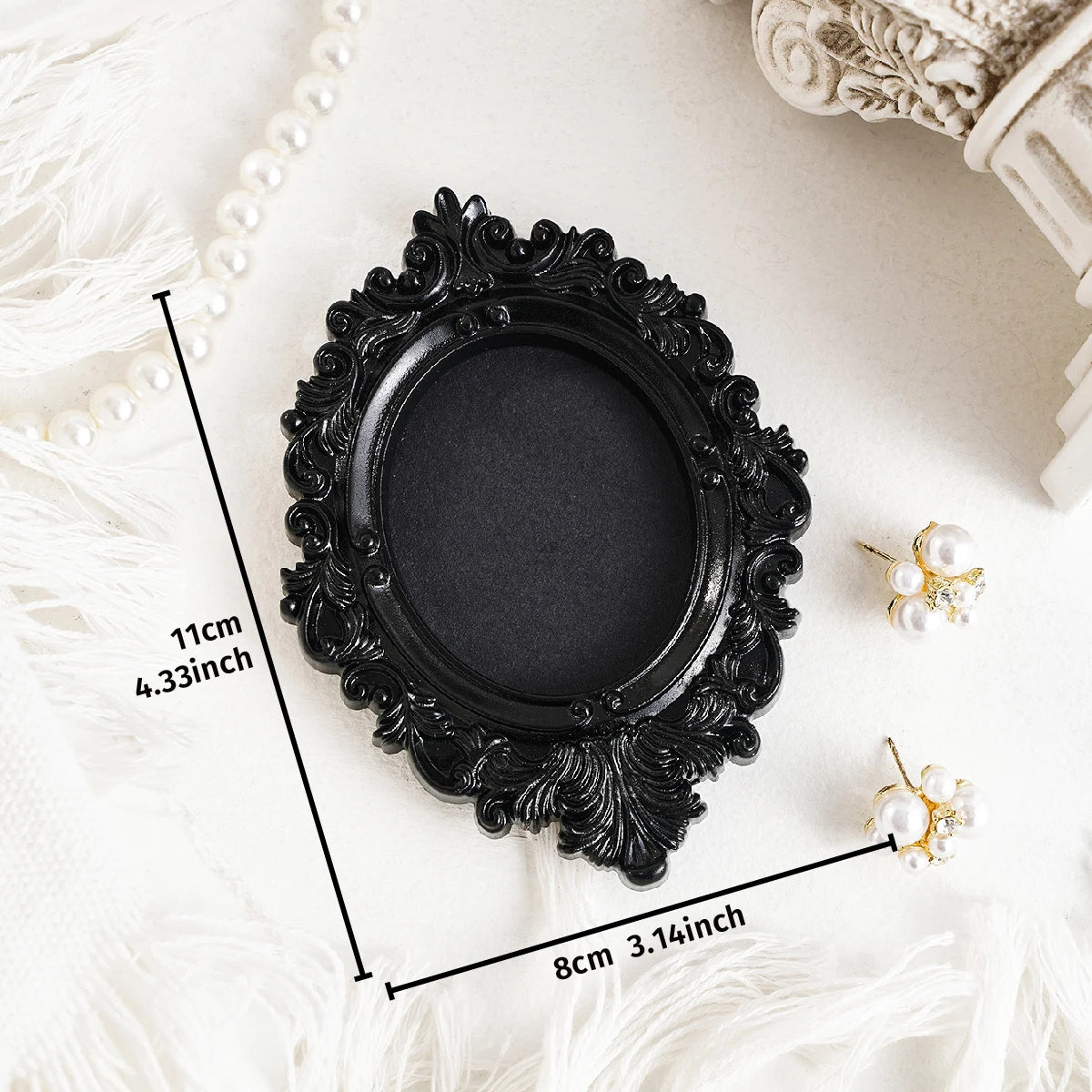 Cadre ovale orné noir, 11 sur 8 cm